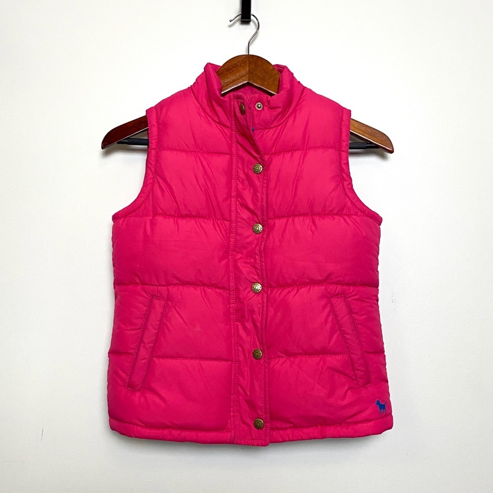 Girls raspberry colored Boden Kids puffer vest.